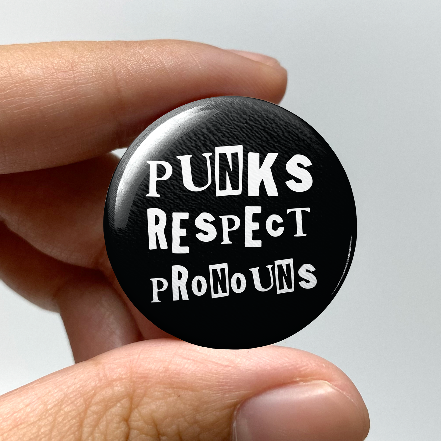 wlwirl - Punks Respect Pronouns 1.25" Pin-Back Button